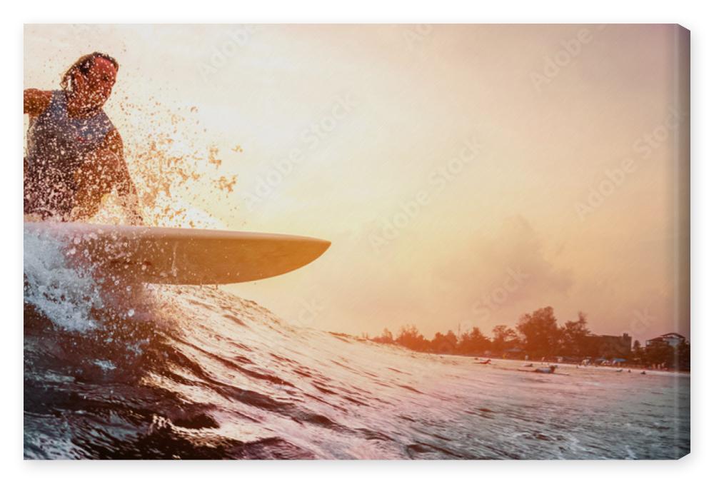 Obraz na płótnie Surfer rides the ocean wave