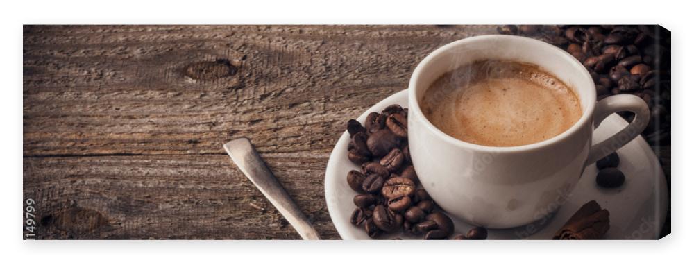 Obraz na płótnie Cup of coffee on wooden table