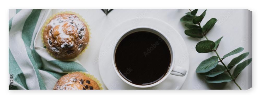 Obraz na płótnie Coffee and two muffins on