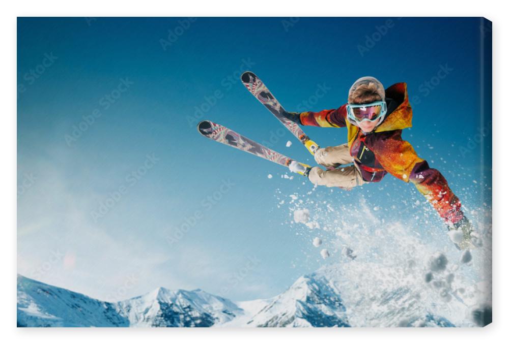 Obraz na płótnie Skiing. Jumping skier. Extreme