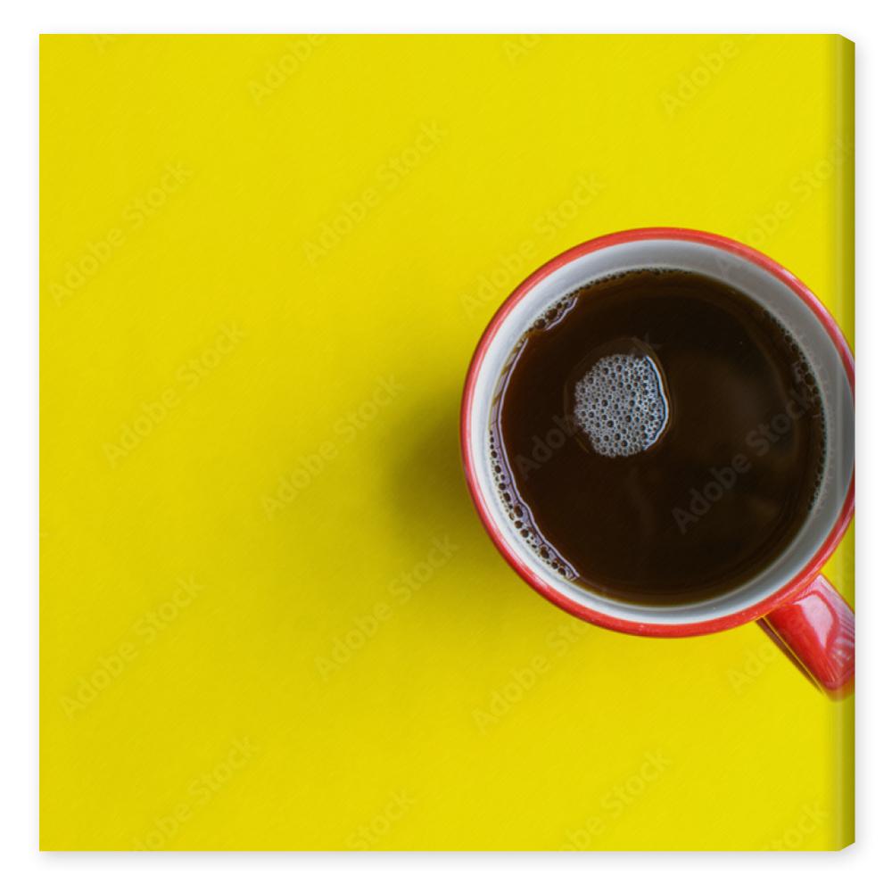 Obraz na płótnie cup of coffee on yellow