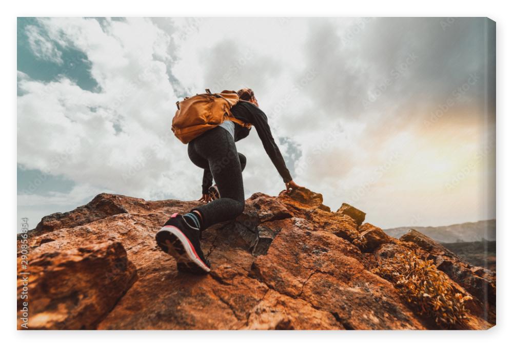 Obraz na płótnie Success woman hiker hiking on