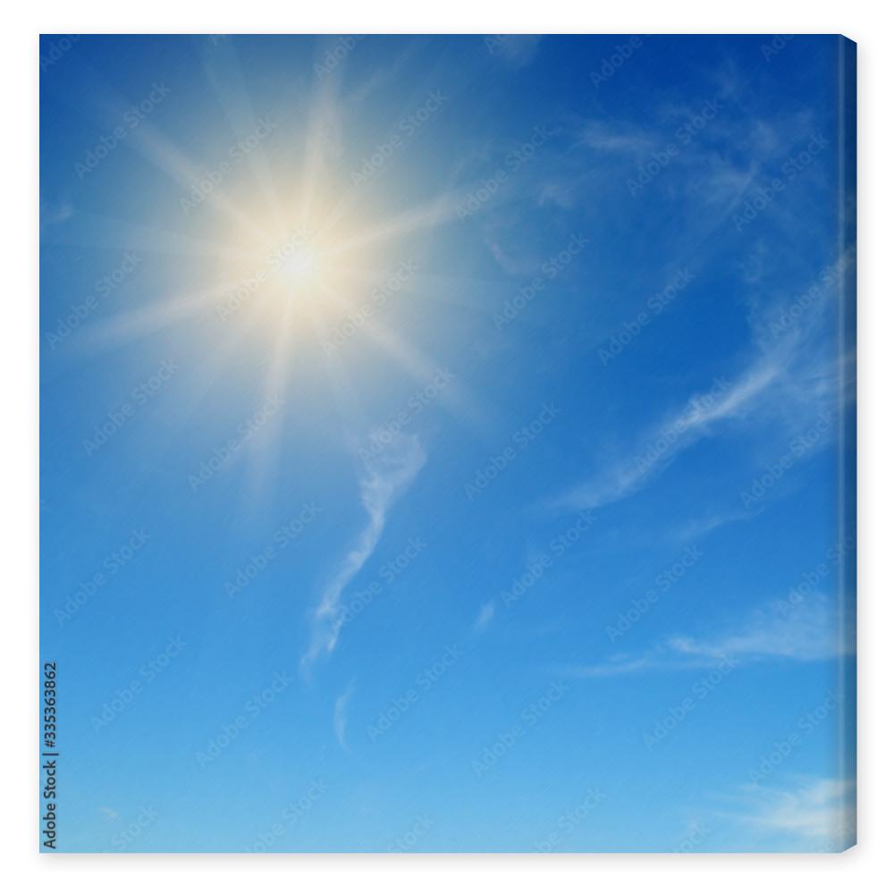 Obraz na płótnie Couds in the blue sky and sun.
