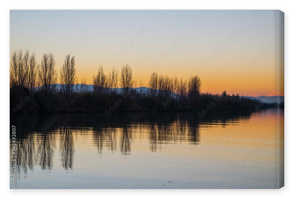Obraz na płótnie Clear sky Sunset in Ebro river