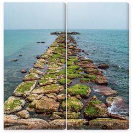 Obraz Dyptyk Stone jetty at sea. Stone