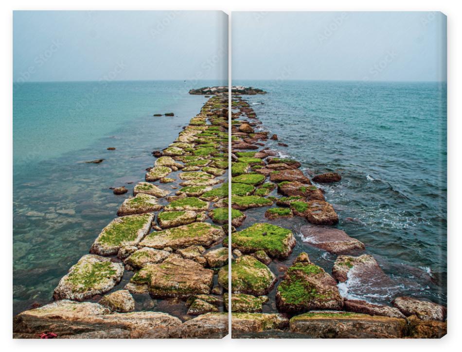 Obraz Dyptyk Stone jetty at sea. Stone