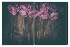 Obraz Dyptyk tea rose on wooden background