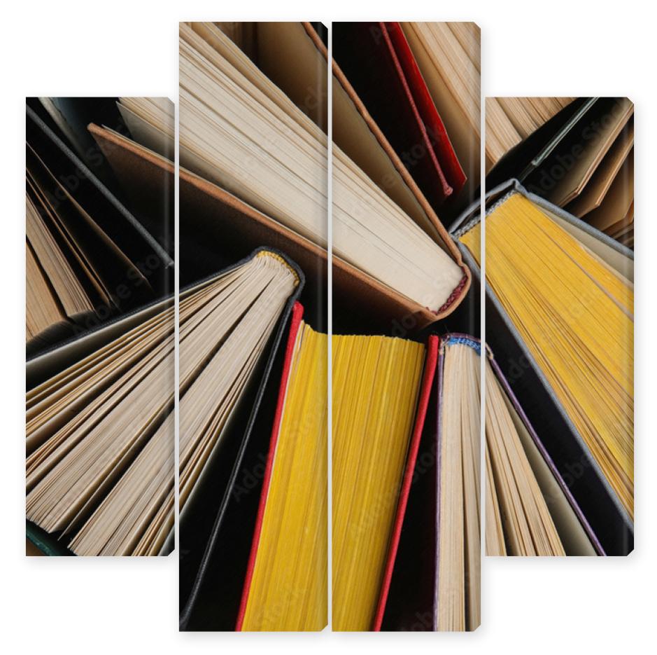 Obraz Kwadryptyk Stack of hardcover books as